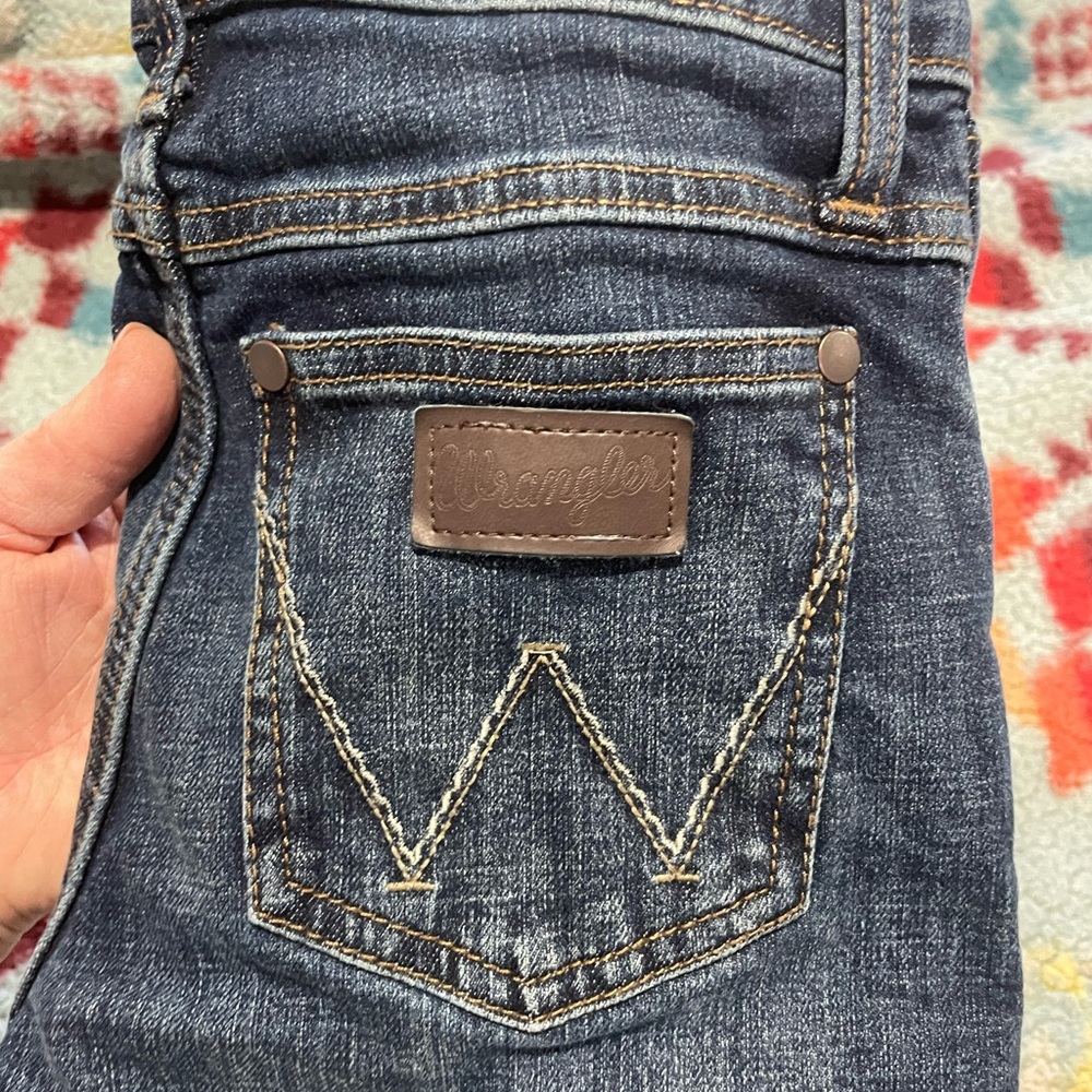 Boys Wrangler retro denim jeans. Size 10 regular
Washed but never worn
